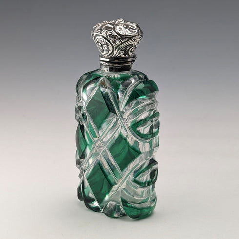 Antique British silver-lidded green cut glass portable perfume bottle
